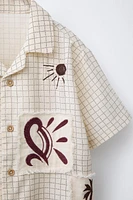 CHEMISE À CARREAUX ET PIÈCES