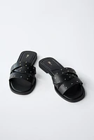 STUDDED FLAT CROSS STRAP SANDALS