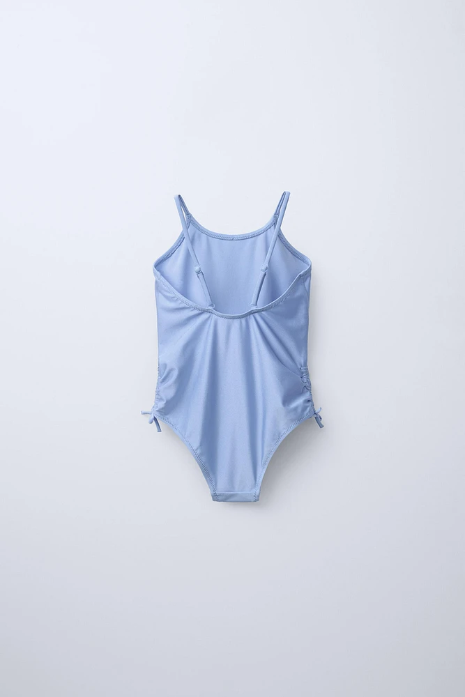 6-14 ANS/ MAILLOT DE BAIN BRILLANT AVEC NŒUDS