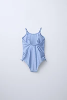 6-14 YEARS/ GLITTER AND BOWS SWIMSUIT