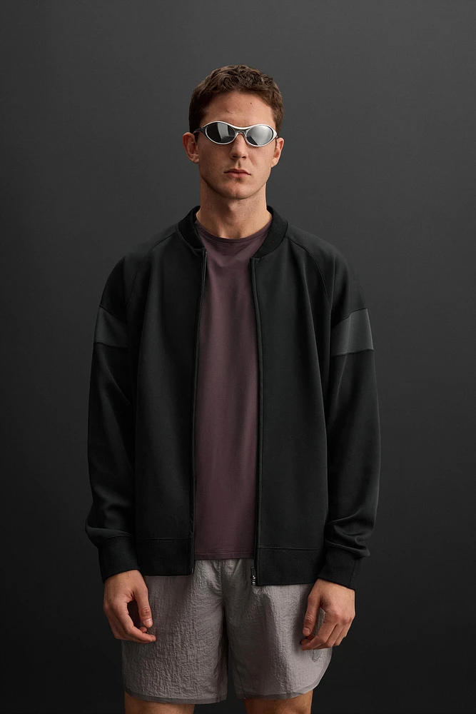 TECHNICAL SWEATSHIRT WITH ZIPPER