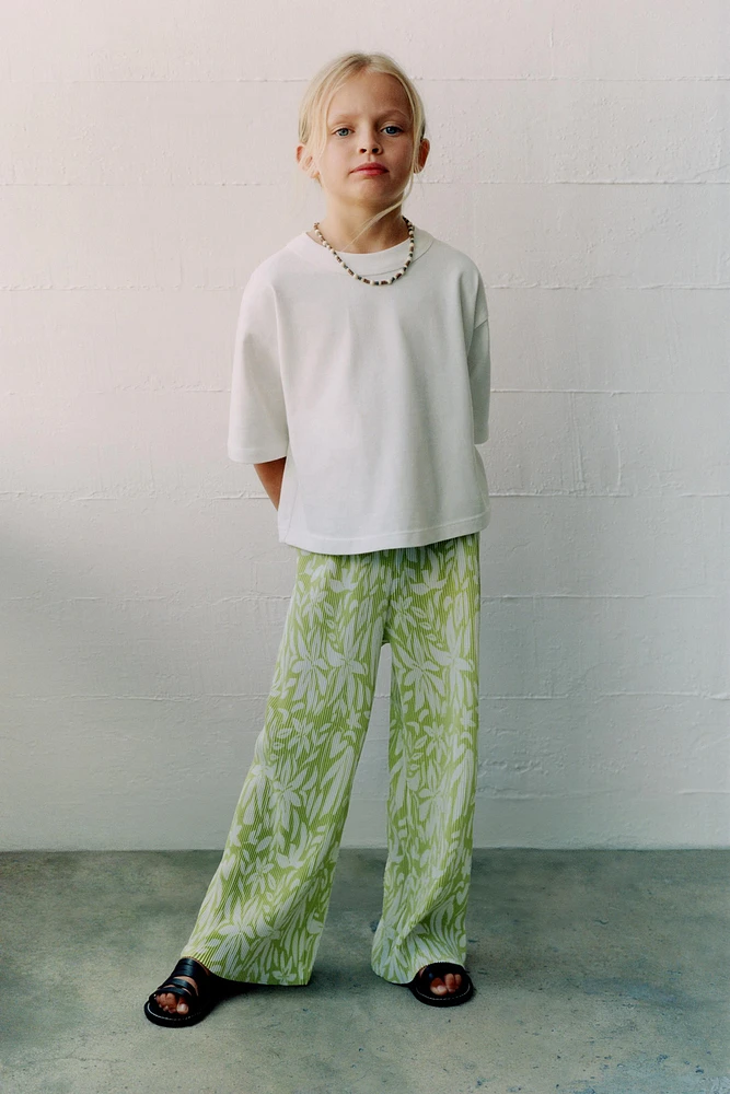 PLEATED PRINTED PANTS