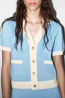 VESTE EN MAILLE MANCHES COURTES