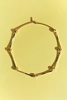 COLLIER AVEC PIÈCES MÉTALLIQUES