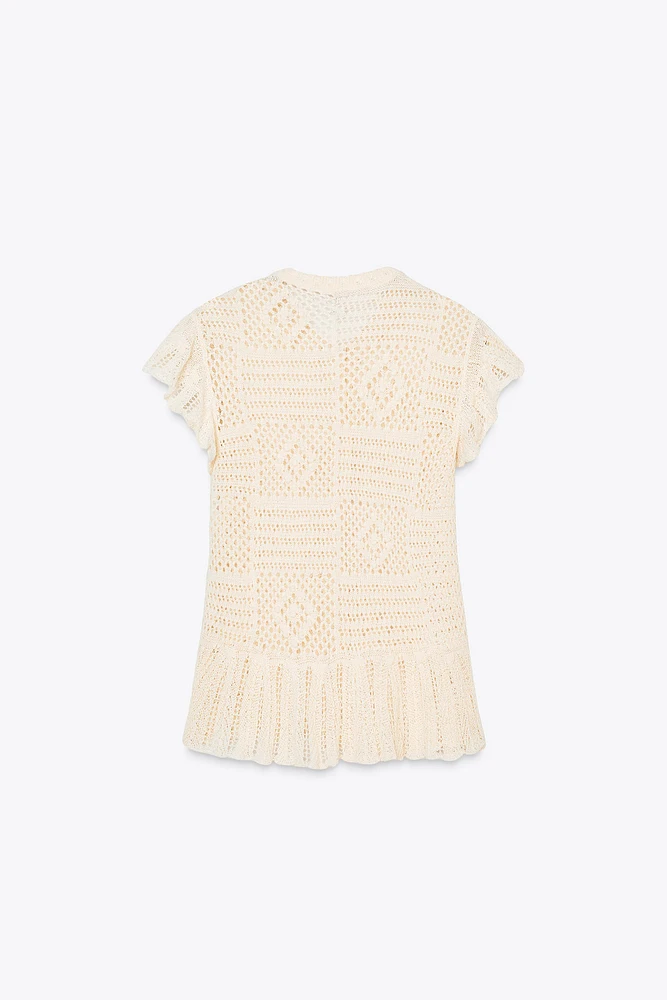 GILET EN MAILLE POINTELLE À VOLANTS