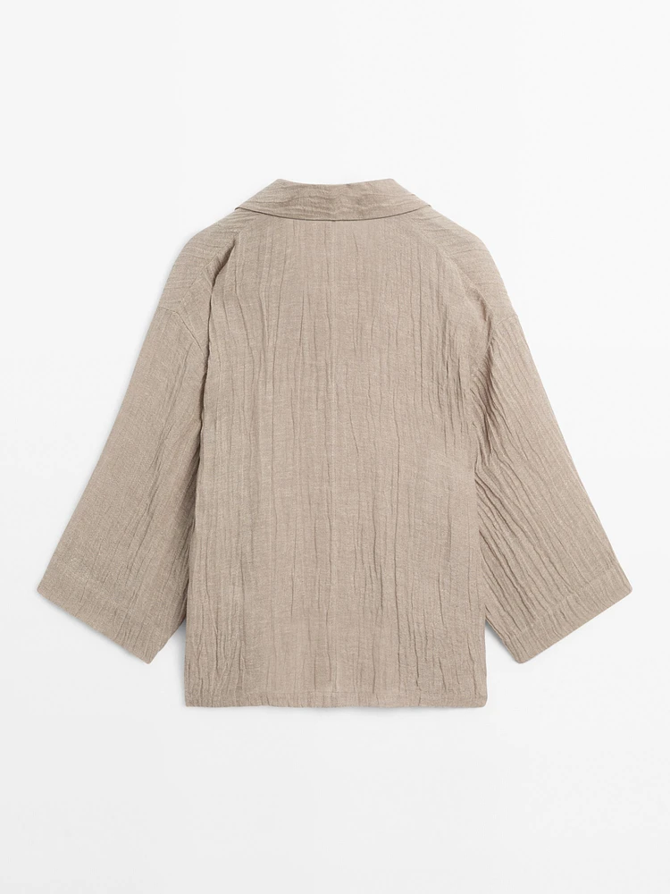 Blouse fluide col ouvert en lin mélangé