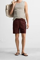 DRAWSTRING SWIM TRUNKS