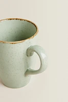 PORCELAIN MUG WITH ANTIQUE FINISH RIM