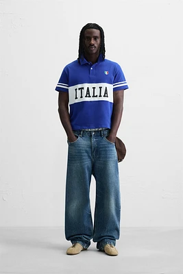 POLO COLOR BLOCK AVEC DRAPEAU