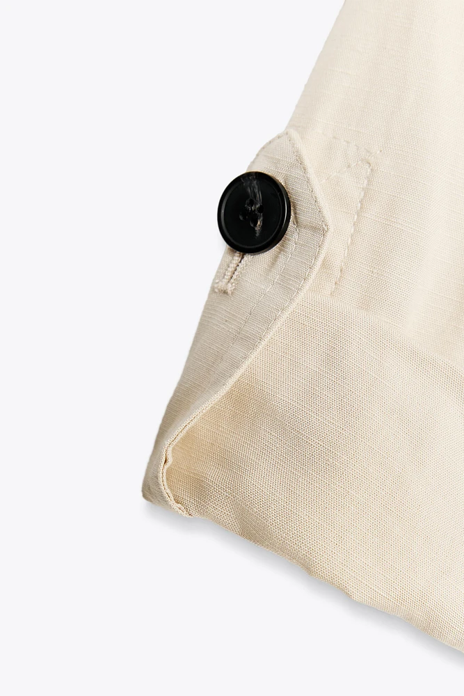 VESTE À MANCHES RETROUSSÉES