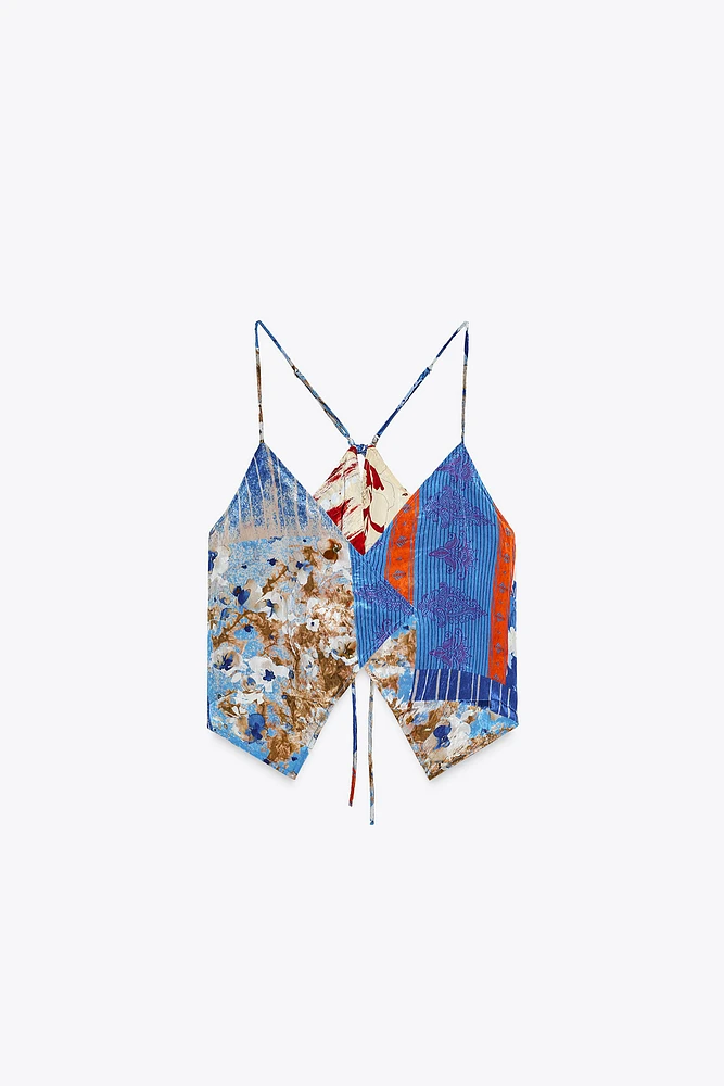 REVERSIBLE ASYMMETRIC PRINT TOP