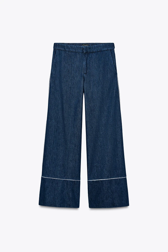 PANTALON LARGE AVEC LISERÉS CONTRASTANTS