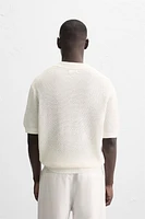 POLO EN MAILLE TEXTURÉE OUVERTE