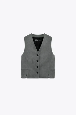 VEST WITH SLITS