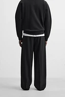 PLEATED WIDE FIT PANTS