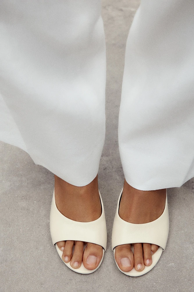 TRANSPARENT WEDGE LEATHER MULES