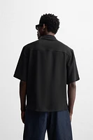 FLOWY POLO SHIRT