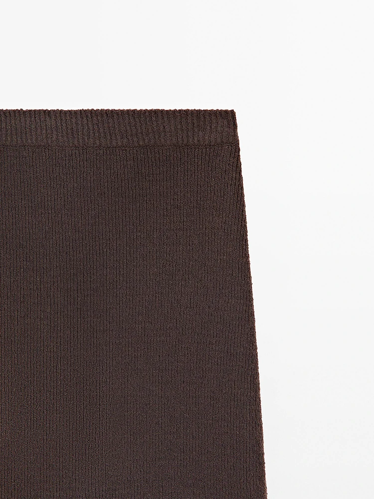 Long knit skirt with fringed hem