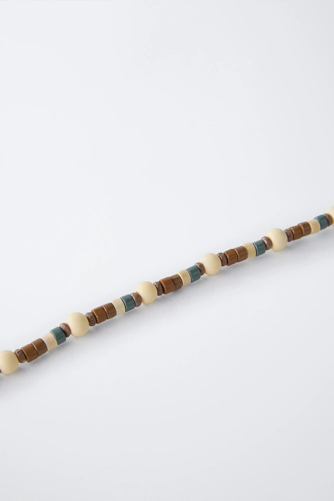 LOT DE DEUX COLLIERS EN BOIS