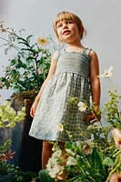 ROBE À CARREAUX VICHY ET FLEURS