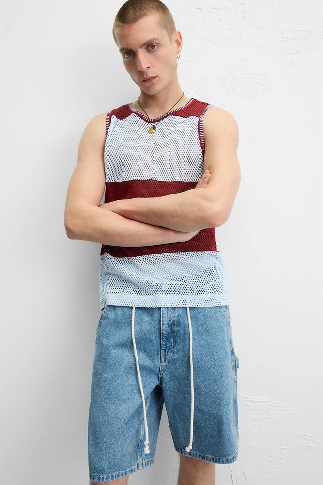 BERMUDA EN DENIM À POCHE DE CHARPENTIER