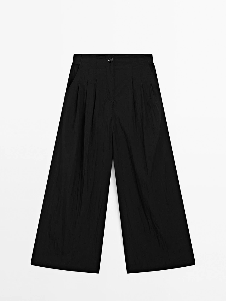 Pantalon palazzo fluide à pinces