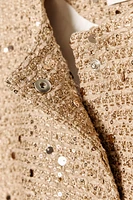 VESTE À SEQUINS ET CEINTURE