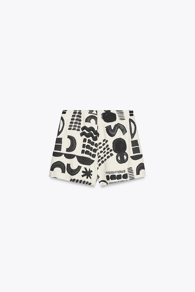 MINI-JUPE IMPRIMÉE BOUCLE