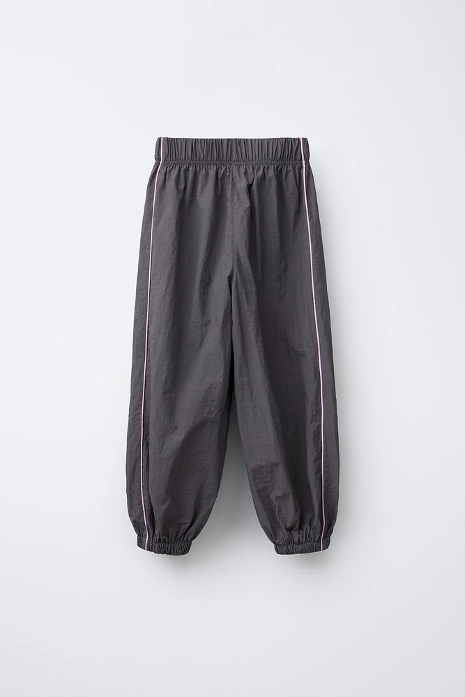 TECHNICAL BOW JOGGER PANTS