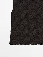 Creased-effect funnel neck top