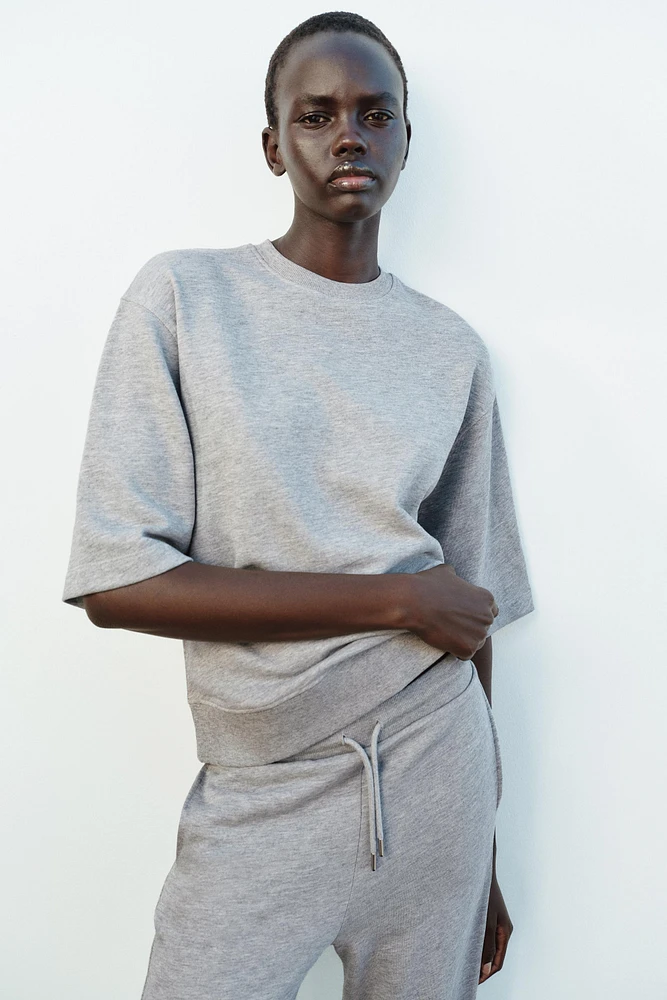 WASHED OVERSIZED SWEATSHIRT