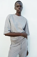 WASHED OVERSIZED SWEATSHIRT