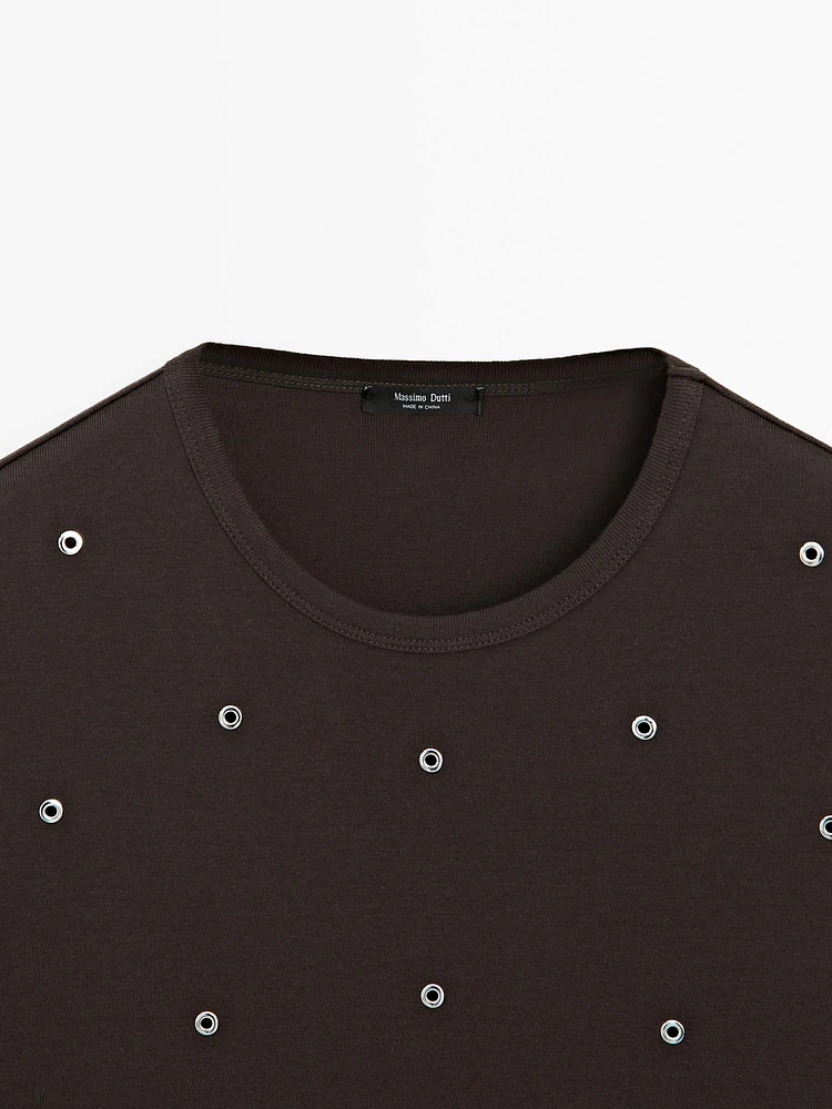 Oversized T-shirt with eyelets