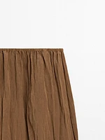 Lightweight pleated skirt with elasticated waistband