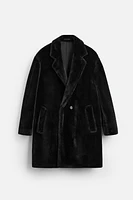 MANTEAU EN FAUSSE FOURRURE