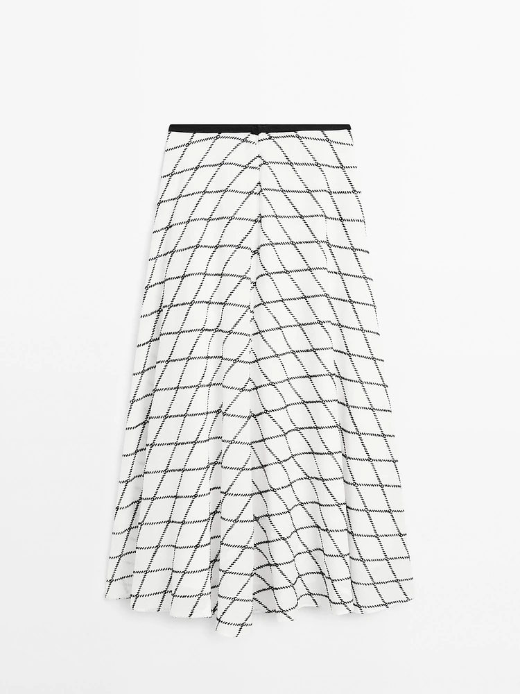Jupe midi ample évasée à carreaux
