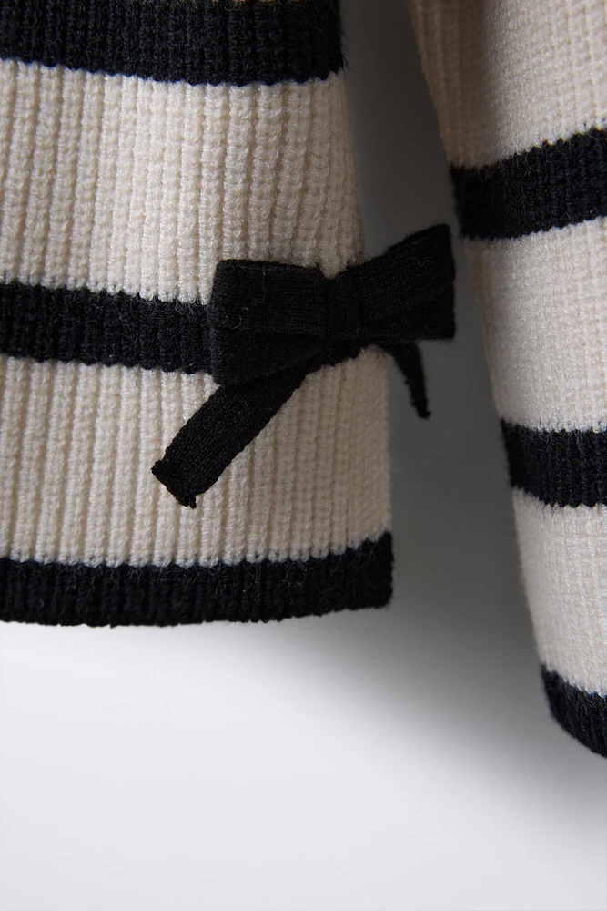 STRIPED KNIT SWEATER WITH BOWS