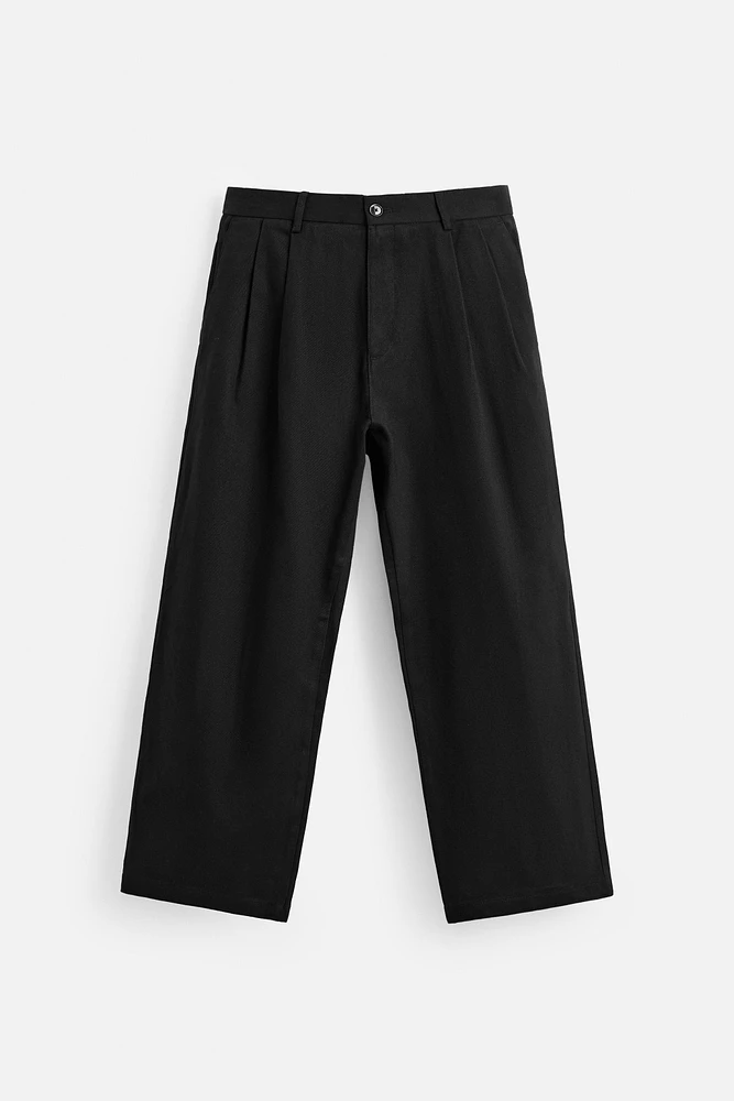 BALLOON FIT PLEATED PANTS