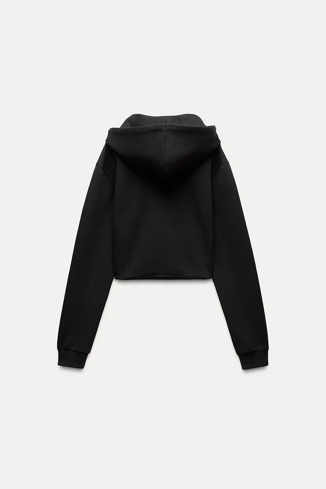 CROPPED INTERLOCK SWEATSHIRT