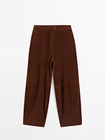 Pantalon court taille basse en cuir et daim