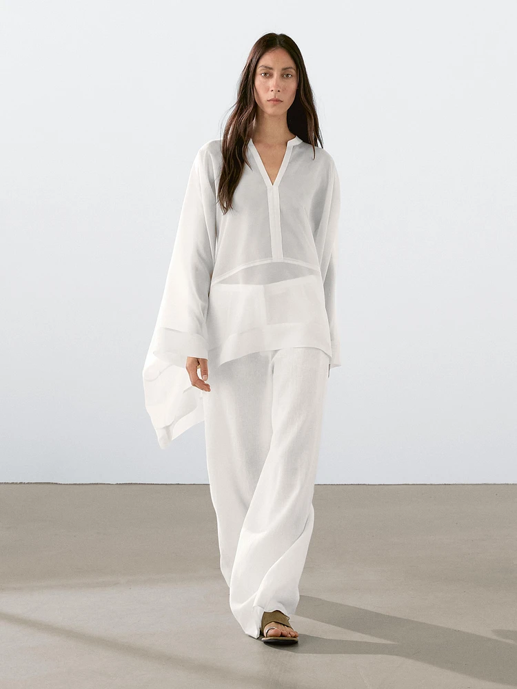 Semi-sheer long flowing shirt