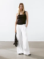 Pantalon large avec surpiqûres contrastantes