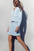 PIPED KNIT MINI SKIRT