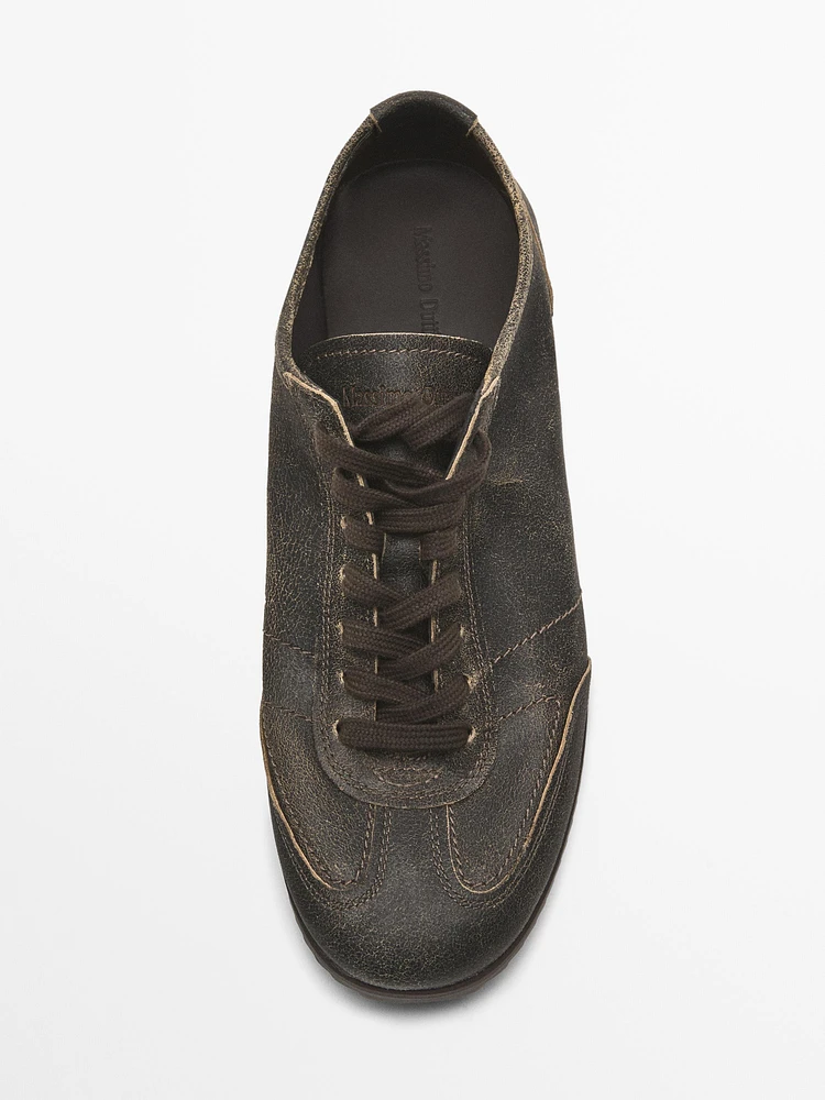 Brown leather trainers