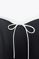 ROBE À BRETELLES VOLANTS AVEC LACET