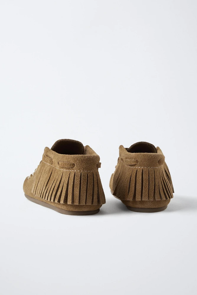 CHAUSSONS À FRANGES EN CUIR