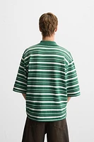 POLO EN MAILLE TEXTURÉE RAYURES