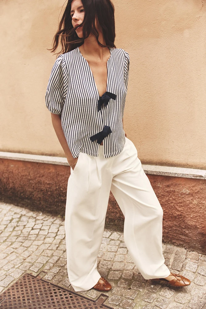 PLEATED WIDE LEG PANTS