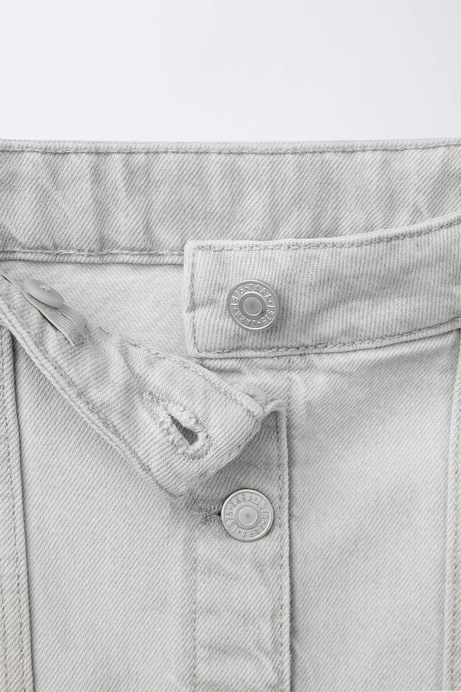 JUPE EN DENIM À COUPES EFFILOCHÉES