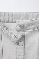JUPE EN DENIM À COUPES EFFILOCHÉES